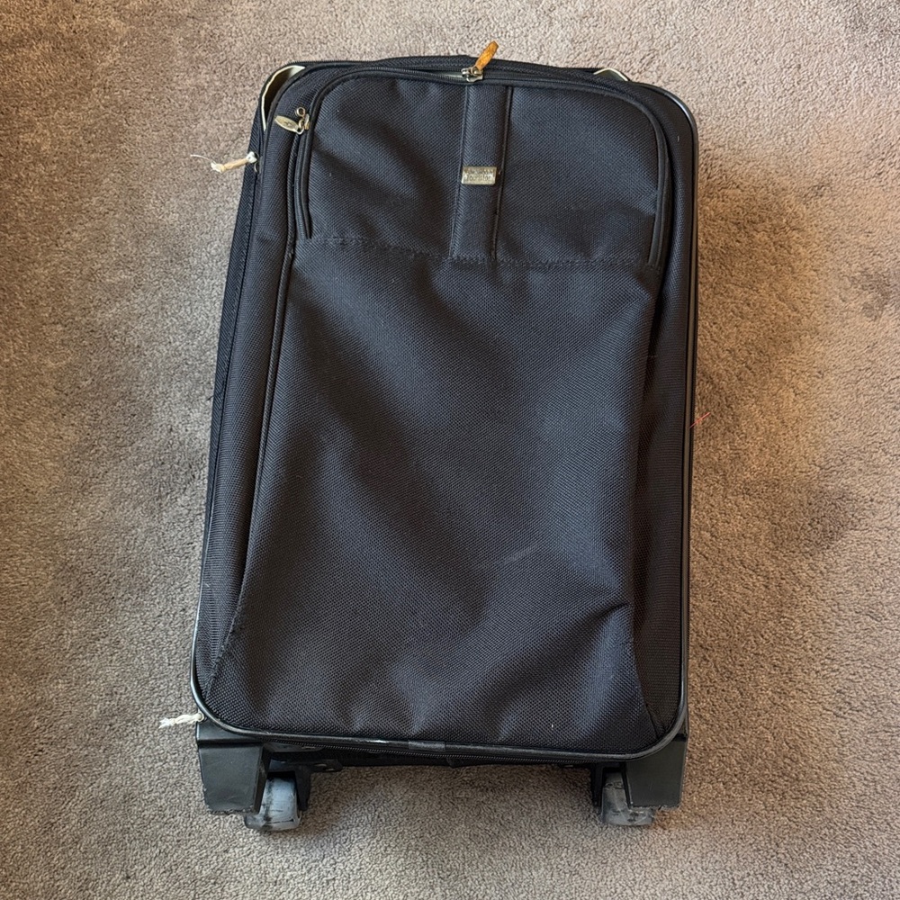 American Tourister Black Roller Suitcase